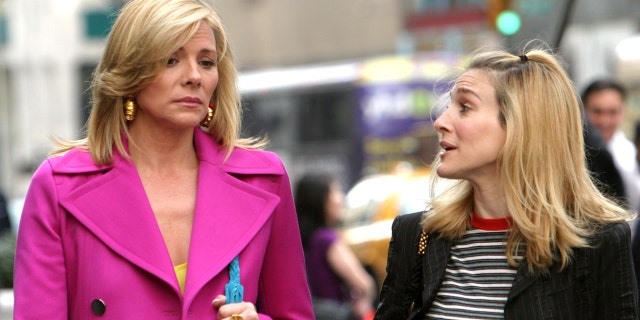 Kim Cattrall and Sarah Jessica Parker filming a scene of "Sex and the City."