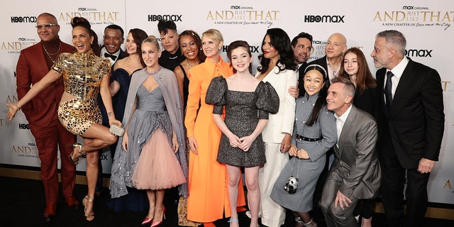 Sarah Jessica Parker poses with the cast and crew at HBO Max's premiere of "And Just Like That" at Museum of Modern Art.