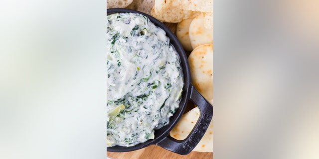 The dip can be made in an oven or smoker. Serve with your desired side dish.