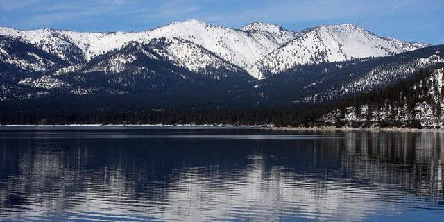 Snow covers the Sierra Nevada mountains and the shoreline of Lake Tahoe on Monday, Jan. 30, 2017, as seen from Memorial Point, Nevada.  