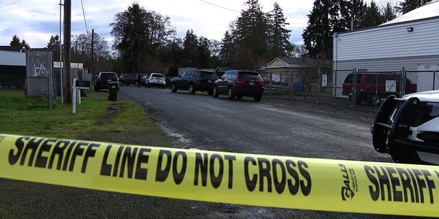 Crime scene tape where a Spanaway, Washington man shot and killed a home intruder on Thursday. 