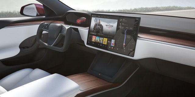 "Passenger Play" allowed video games to be played on front screen with vehicle in motion.
