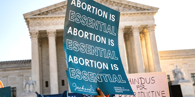 Abortion rights advocates and anti-abortion protesters demonstrate in front of the Supreme Court of the United States Supreme Court of the United States on Dec. 1, 2021 in Washington.