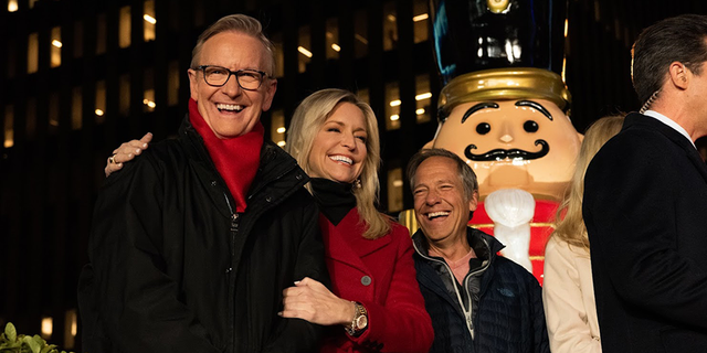 Steve Doocy, Ainsley Earhardt, and Mike Rowe at the All-American Christmas Tree Lighting at Fox Square in Manhattan recently. Steve Doocy contributes warm Christmas memories and more in the new book ‘All American Christmas.’