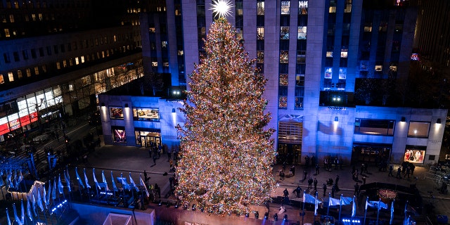 The Rockefeller Center Christmas tree stands lit at Rockefeller Center in New York.