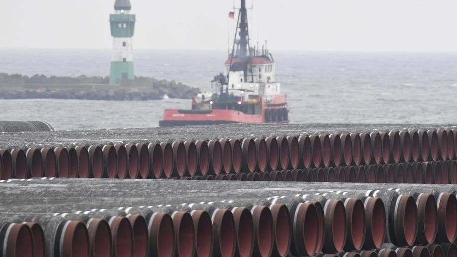 Pipes for the Nord Stream 2 Baltic Sea gas pipeline are stored on the premises of the port of Mukran near Sassnitz, Germany, on Dec. 4, 2020. Russia's natural gas pipeline to Europe is built and ready to flow. But not so fast. The Nord Stream 2 pipeline faces a rocky road ahead. First there's statement by the U.S. secretary of state that gas won't flow if Russia launches military aggression against Ukraine. (Stefan Sauer/dpa via AP, File)