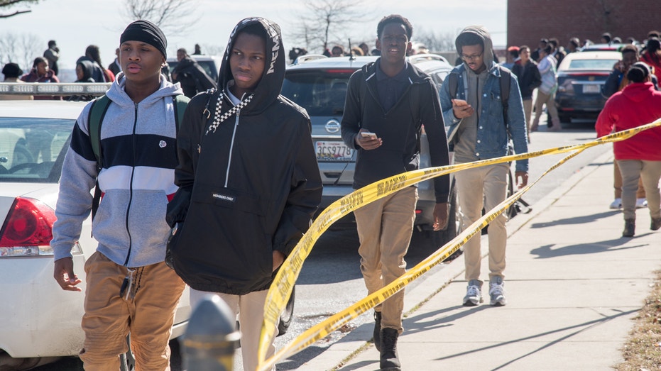 Students at Frederick Douglass High School were dismissed early after a 56-year-old staffer was shot inside the building on February 7, 2019. Officials say a 25-year-old man entered the school shortly after noon and shot a hall monitor. (Ulysses Munoz/Baltimore Sun/TNS)
