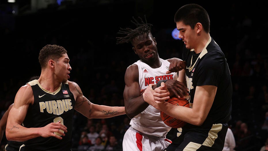 Williams, No. 1 Purdue rally past NC State 82-72 in OT