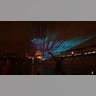 A laser display is pictured above the Millennium Bridge with St Paul's Cathedral seen behind, an alternative to the usual New Year's fireworks display, in central London just after midnight on January 1, 2022.