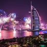 Fireworks illuminate the sky around the Burj Khalifa, the world's tallest tower in Dubai as part of new year celebrations on January 1, 2022.