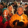 People attend a vigil downtown to honor those killed and wounded during the recent shooting at Oxford High School on December 03, 2021 in Oxford, Michigan. Four students were killed and seven others injured on November 30, when student Ethan Crumbley allegedly opened fire with a pistol at the school. Crumbley has been charged in the shooting. Today his parents were also charged.
