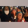 People attend a vigil downtown to honor those killed and wounded during the recent shooting at Oxford High School on December 03, 2021 in Oxford, Michigan. Four students were killed and seven others injured on November 30, when student Ethan Crumbley allegedly opened fire with a pistol at the school. Crumbley has been charged in the shooting. Today his parents were also charged.