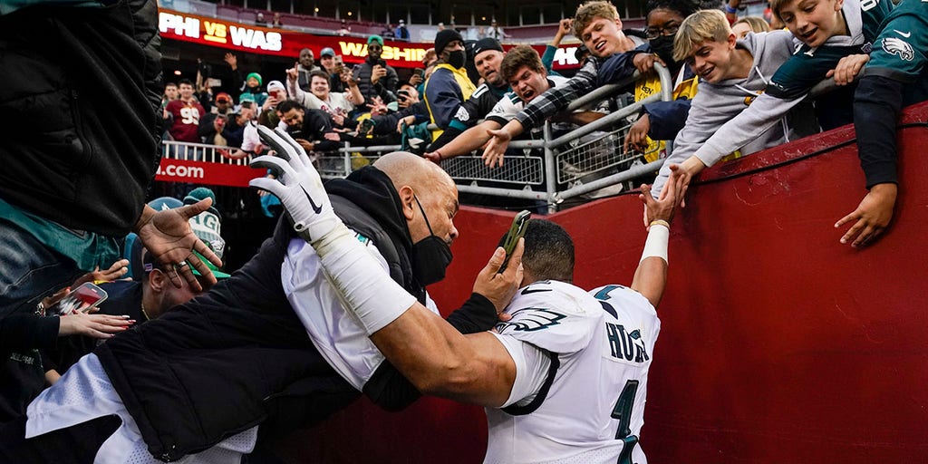 Hurts avoids railing collapse, Eagles move closer to playoff berth