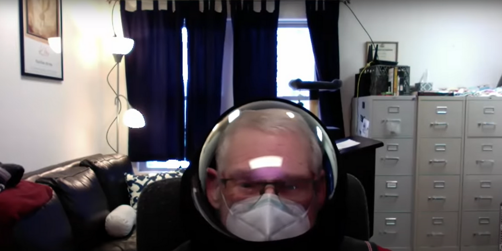 Michigan professor wearing space helmet tells students they
are 'vectors of disease' in Zoom rant