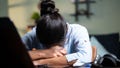 young Business woman sleeping by closing laptop while working, concept of new normal burnout, over or late night work at home during coronavirus covid-19 pandemic.