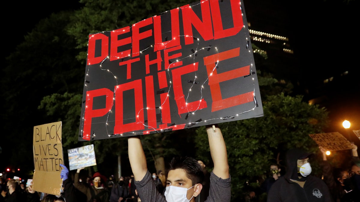 Protesters rally against the death in Minneapolis police custody of George Floyd, in Portland, Oregon, June 13, 2020.