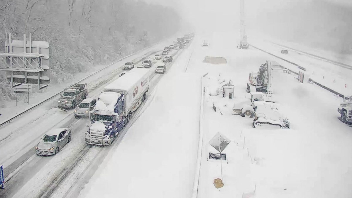 Vehicles are seen on an icy stretch of Interstate 95 closed as a storm blankets the U.S. region in snow, near Fredericksburg, Virginia, U.S. January 3, 2022. Picture taken January 3, 2022. Virginia Department of Transportation/Handout via REUTERS