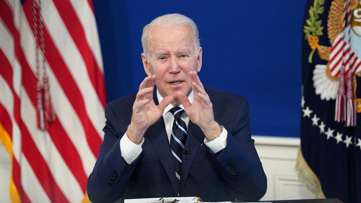 FILE PHOTO: U.S. President Joe Biden delivers remarks on the administration's coronavirus disease (COVID-19) surge response in the South Court Auditorium at the White House in Washington, U.S., January 13, 2022. REUTERS/Kevin Lamarque/File Photo