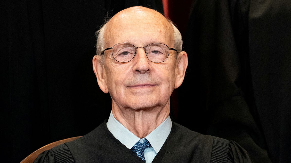 Associate Justice Stephen Breyer poses during a group photo of the justices at the Supreme Court in Washington, April 23, 2021. 