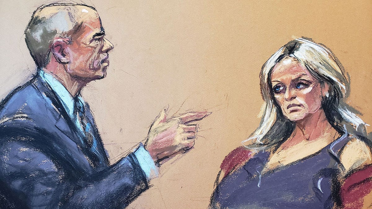 Former attorney Michael Avenatti, representing himself, cross-examines witness Stormy Daniels during his criminal trial at the United States Courthouse in the Manhattan borough of New York City, U.S., January 27, 2022 in this courtroom sketch.?