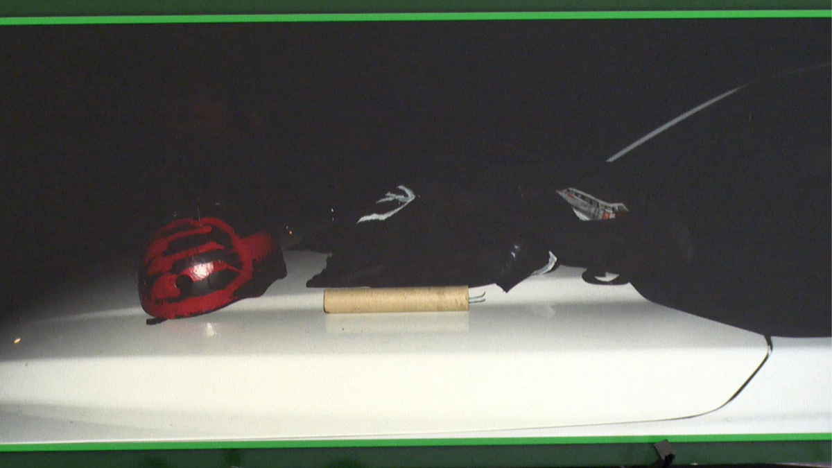 Smith's alleged backpack, helmet, and pipe-type explosive that were found at the scene. (Credit: Pinellas County Sheriff's Office)