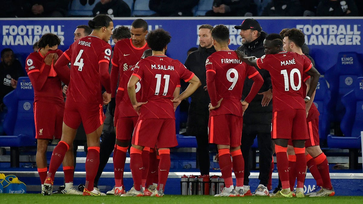 Liverpool's manager Jurgen Klopp gives instructions to his players during the English Premier League soccer match between Leicester City and Liverpool at the King Power Stadium in Leicester, England, Tuesday, Dec. 28, 2021.