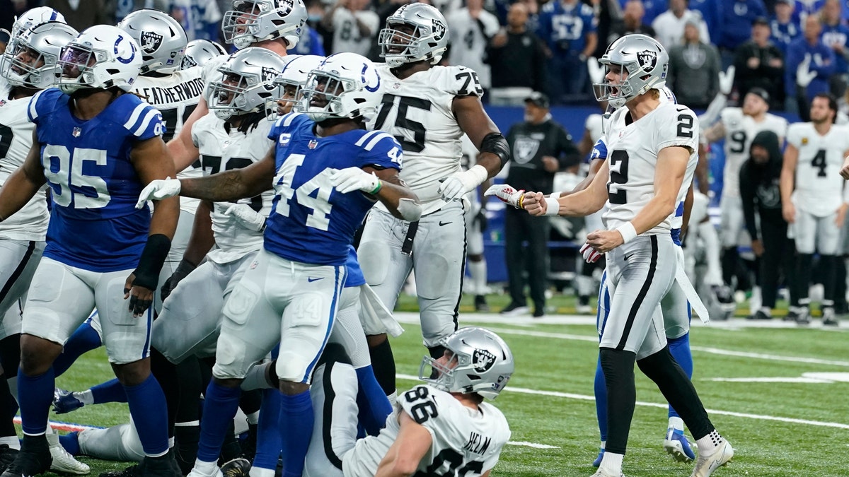 Las Vegas Raiders kicker Daniel Carlson (2) celebrates after kicking a 33-yard field goal on the final play of an NFL football game against the Indianapolis Colts, Sunday, Jan. 2, 2022, in Indianapolis. The Raiders won 23-20.