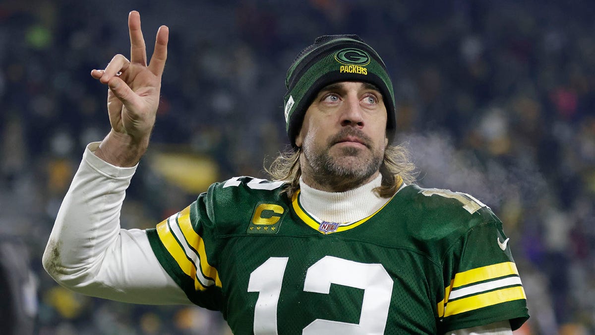 Green Bay Packers' Aaron Rodgers acknowledges the crowd after an NFL football game against the Minnesota Vikings Sunday, Jan. 2, 2022, in Green Bay, Wis. The Packers won 37-10.