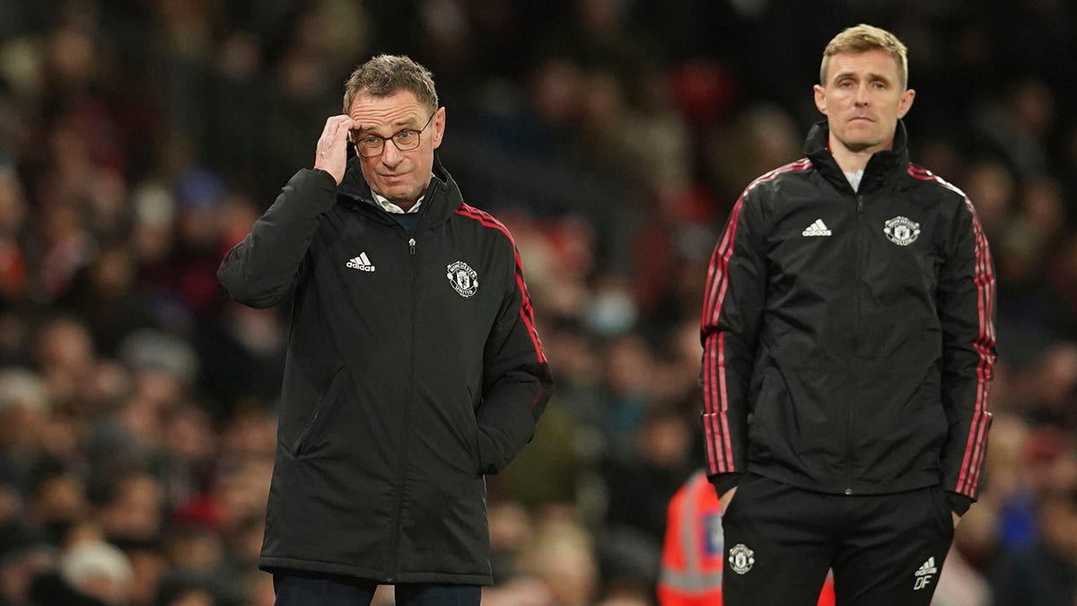 Manchester United's manager Ole Gunnar Solskjaer rects after his team received a goal during the English Premier League soccer match between Manchester United and Wolverhampton Wanderers at Old Trafford stadium in Manchester, England, Monday, Jan.3, 2022.