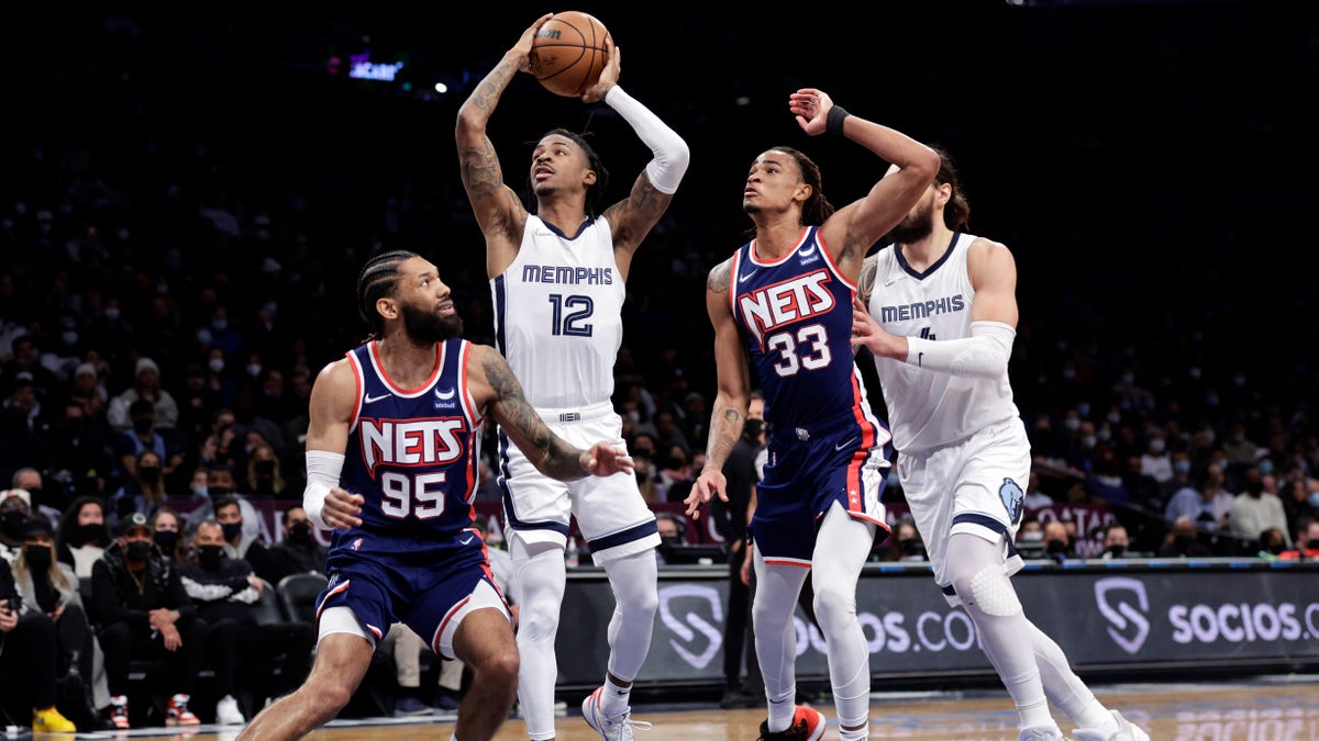 The NBA announced before the game that Morant (12) was named the player of the week in the Western Conference