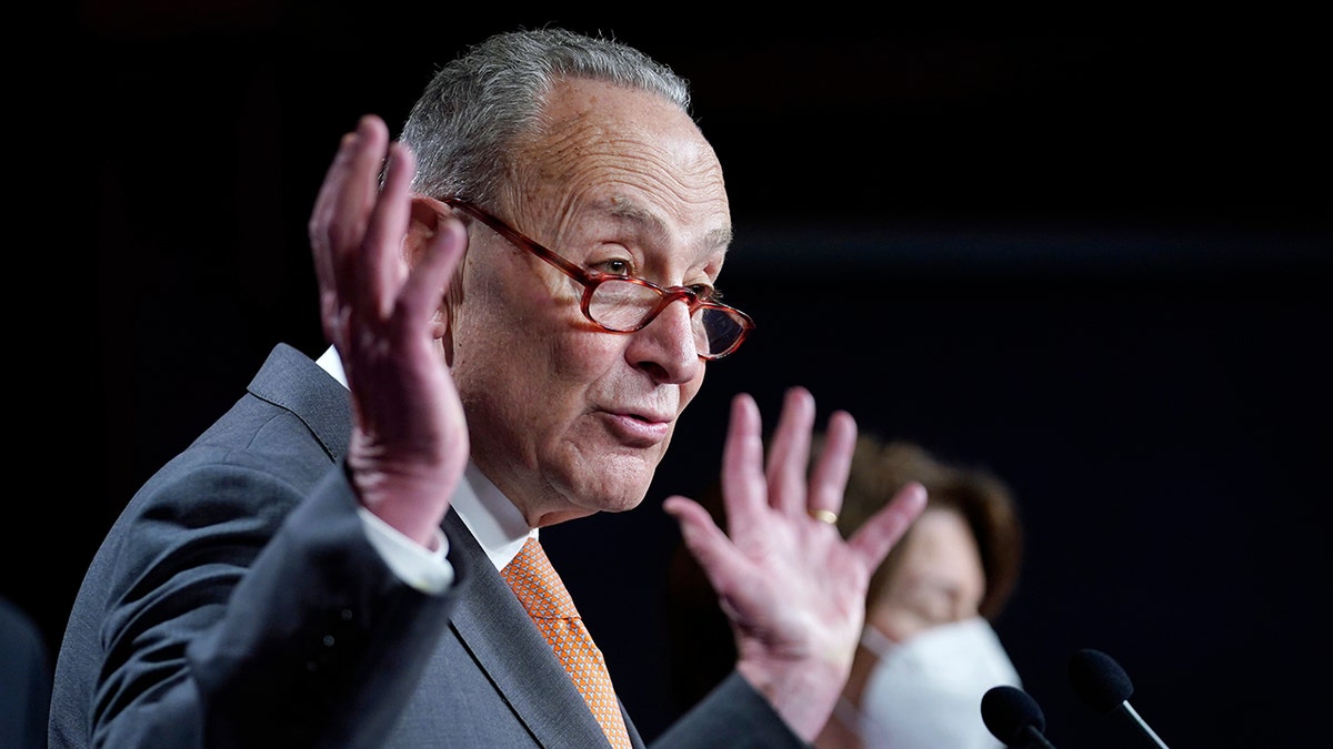 Senate Majority Leader Chuck Schumer speaks during a news conference on Capitol Hill in Washington, Tuesday, Jan. 4, 2022. 