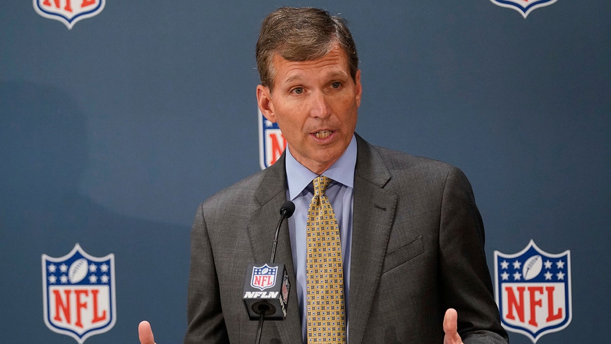 Allen Sills, chief medical officer for the NFL, speaks to reporters during the NFL football owners meeting in New York City, Oct. 26, 2021. 