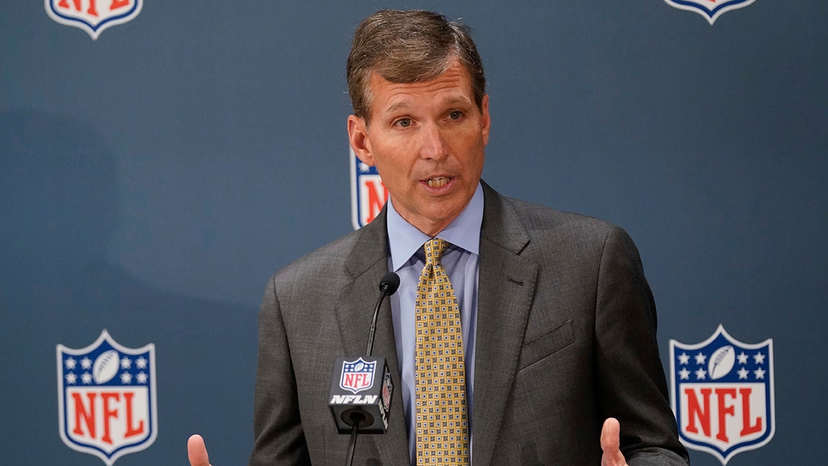 Allen Sills, chief medical officer for the NFL, speaks to reporters during the NFL football owners meeting in New York City, Oct. 26, 2021.