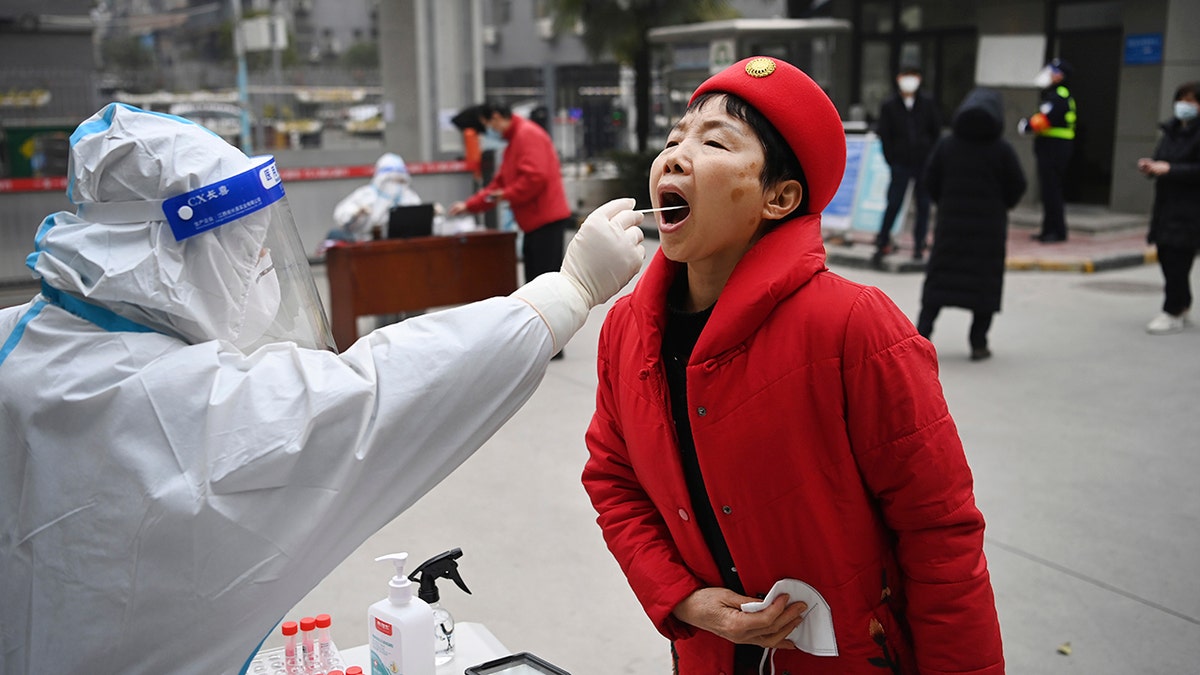 Chinese cities are going on lockdown in response to positive coronavirus tests, with one city aiming to test 14 million people over a 48 hour span. Residents of the port city of Tianjin, where 14 million people live, are advised to stay home until they are tested, BBC reported Monday. People will only be allowed to ride public transportation until after they receive a negative test. The city is aiming to test its 14 million residents over 48 hours after 20 people tested positive, including two with the omicron variant of the virus. OLYMPIC CORPORATE PARTNER 'PROUD' OF SPONSORSHIP DESPITE CHINA'S TREATMENT OF UYGHURS Three other cities, Anyang, Xi’an and Yuzhou are locked down as of Tuesday, leaving about 20 million people confined to their homes. The lockdown of Anyang, home to 5.5 million people, was announced late Monday after two cases of the omicron variant were reported. Residents are not allowed to go out and stores have been ordered shut except those selling necessities. ENES KANTER FREEDOM SAYS TEAMMATE OF LEBRON JAMES TOLD HIM TO KEEP CRITICIZING NBA STAR OVER CHINA Another 13 million people have been locked down in Xi’an for nearly three weeks, and 1.1 million more in Yuzhou for more than a week. It wasn't clear how long the lockdown of Anyang would last, as it was announced as a measure to facilitate mass testing of residents, which is standard procedure in China's strategy of identifying and isolating infected people as quickly as possible. BIDEN ADMINISTRATION WILL NOT SEND ANY OFFICIAL REPRESENTATION TO 2022 WINTER OLYMPICS IN BEIJING, PSAKI SAYS China is aiming to achieve a zero-COVID policy as the nation’s capital prepares to host the Olympics next month. Organizers launched a "closed loop" operation in Beijing, where participants can only leave the bubble to quarantine or if they are also leaving the country. CLICK HERE TO GET THE FOX NEWS APP The country is also preparing to celebrate the Lunar New Year on Feb. 1, when people typically travel.