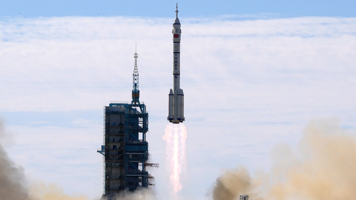 A Long March-2F Y12 rocket carrying a crew of Chinese astronauts in a Shenzhou-12 spaceship lifts off at the Jiuquan Satellite Launch Center in Jiuquan in northwestern China, Thursday, June 17, 2021. (AP Photo/Ng Han Guan, File)