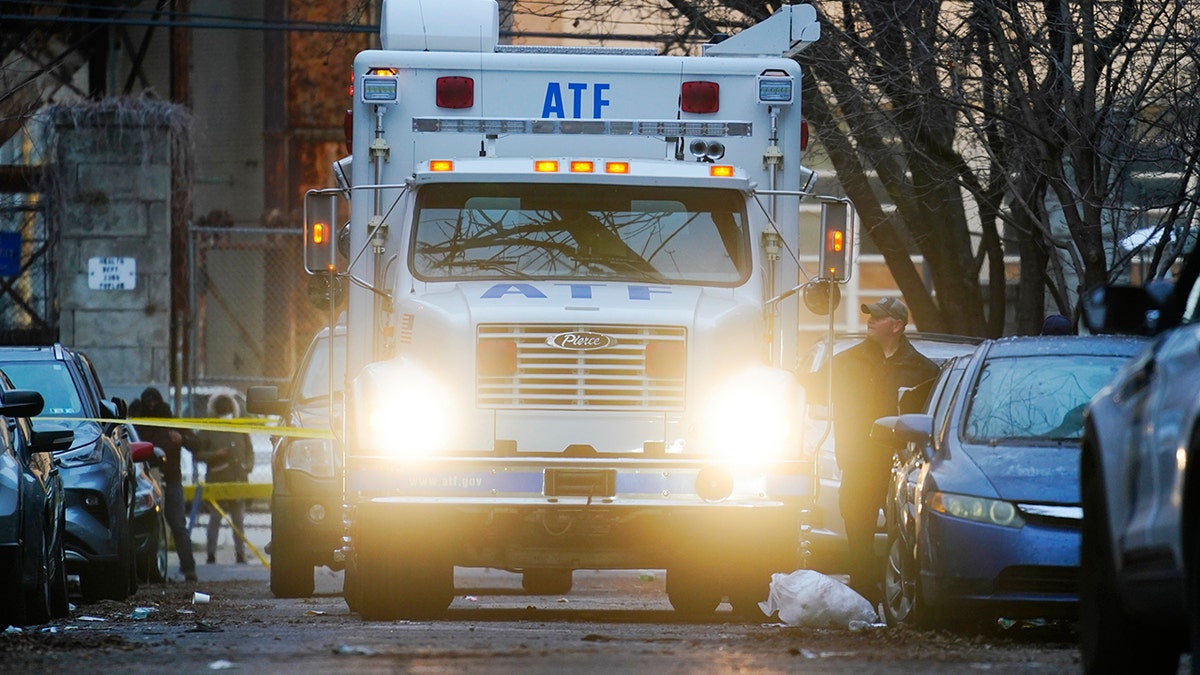 A response vehicle is parked near the scene of Wednesday's deadly fire in the Fairmount neighborhood of Philadelphia., Thursday, Jan. 6, 2022. (AP Photo/Matt Rourke)