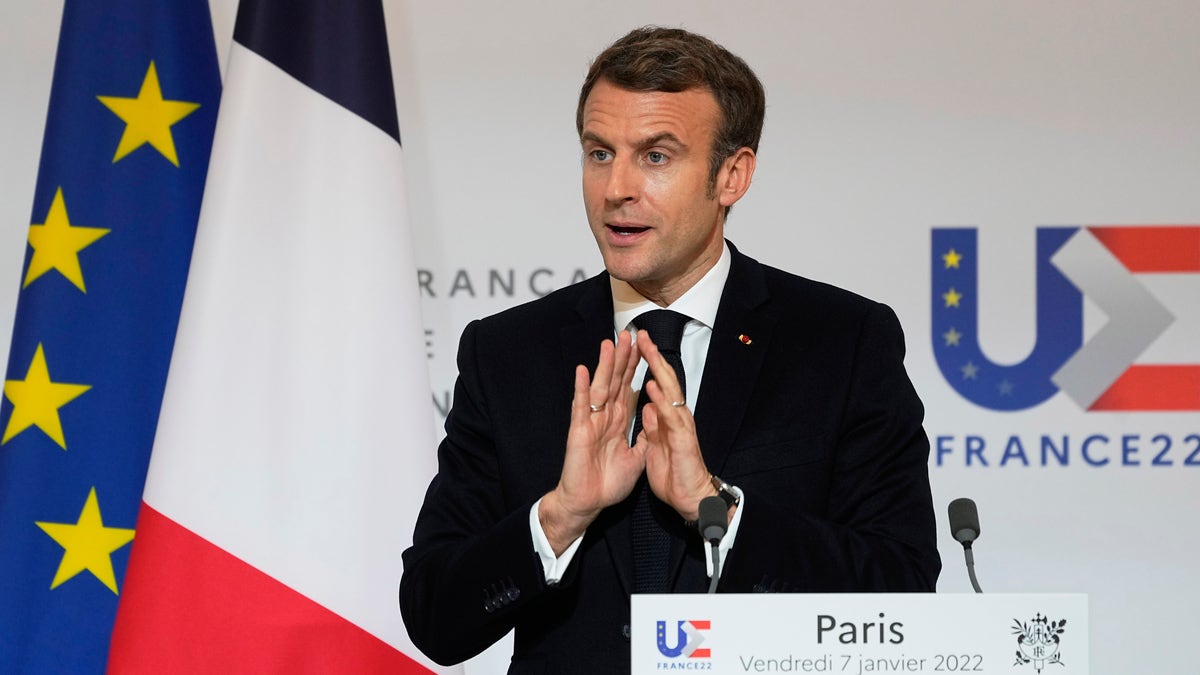 French President Emmanuel Macron speaks as he participates in a media conference with European Commission President Ursula von der Leyen after a meeting at the Elysee Palace in Paris, France, Friday, Jan. 7, 2022. (AP Photo/Michel Euler, Pool)