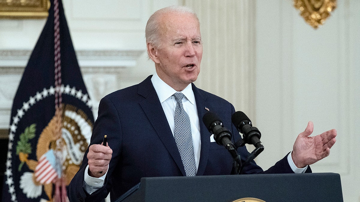 President Biden speaks about the 2021 jobs report in the State Dining Room of the White House, Friday, Jan. 7, 2022, in Washington.