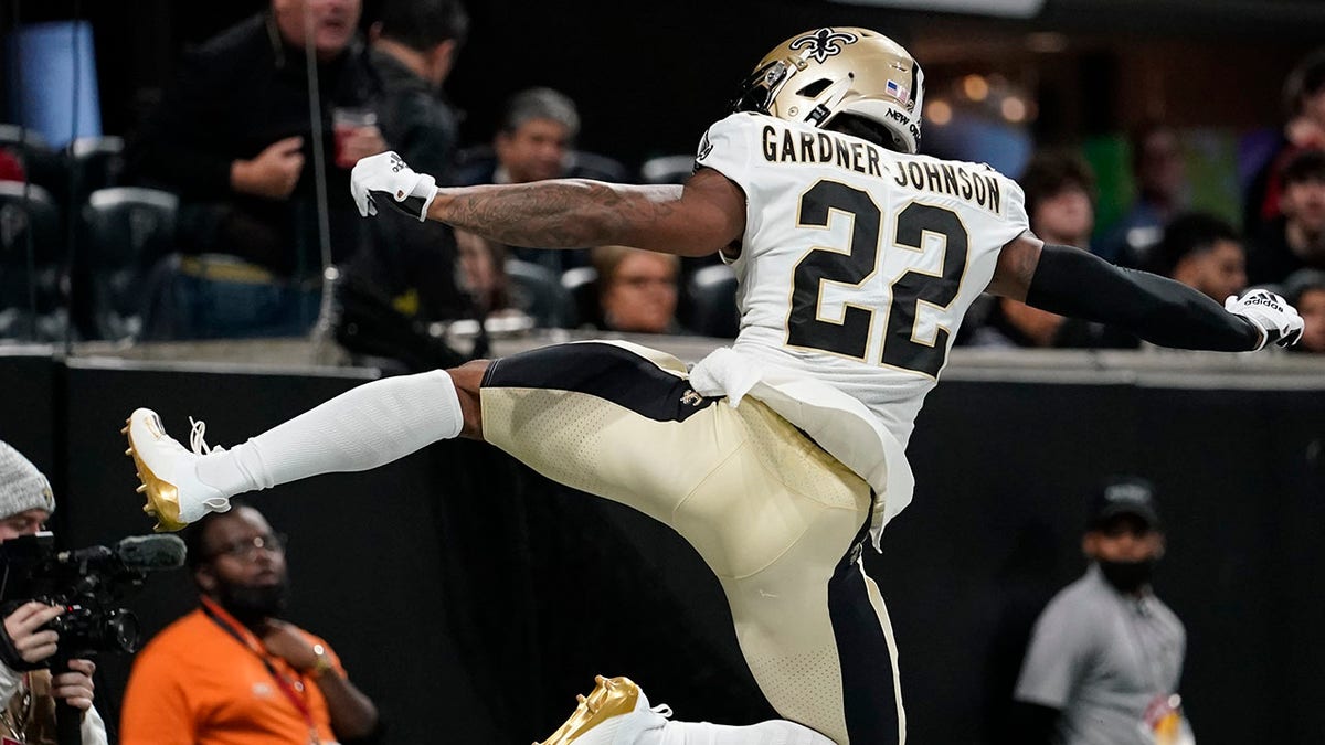 New Orleans Saints defensive back Chauncey Gardner-Johnson (22) celebrates his interception against the Atlanta Falcons during the first half of an NFL football game, Sunday, Jan. 9, 2022, in Atlanta.