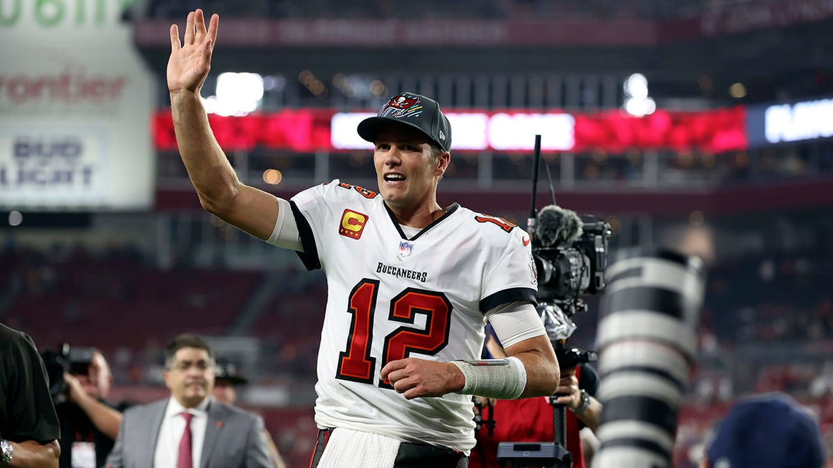 Tampa Bay Buccaneers quarterback Tom Brady (12) waves to fans after the team defeated the Carolina Panthers during an NFL football game Sunday, Jan. 9, 2022, in Tampa, Fla.