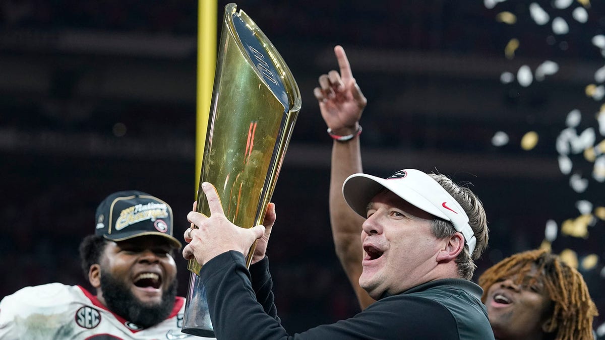 Georgia head coach Kirby Smart celebrates after the College Football Playoff championship football game against Alabama Tuesday, Jan. 11, 2022, in Indianapolis. Georgia won 33-18.