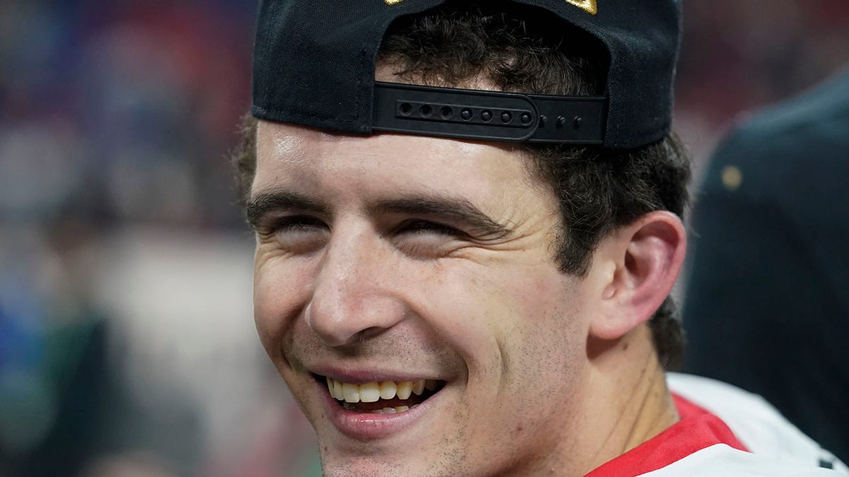 Georgia's Stetson Bennett celebrates after the College Football Playoff championship football game against Alabama Tuesday, Jan. 11, 2022, in Indianapolis. Georgia won 33-18.