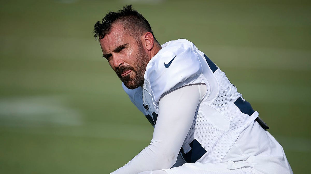 FILE - Los Angeles Rams safety Eric Weddle watches during an NFL football training camp in Irvine, Calif., on July 30, 2019. Weddle is coming out of retirement to rejoin the Los Angeles Rams for the playoffs.