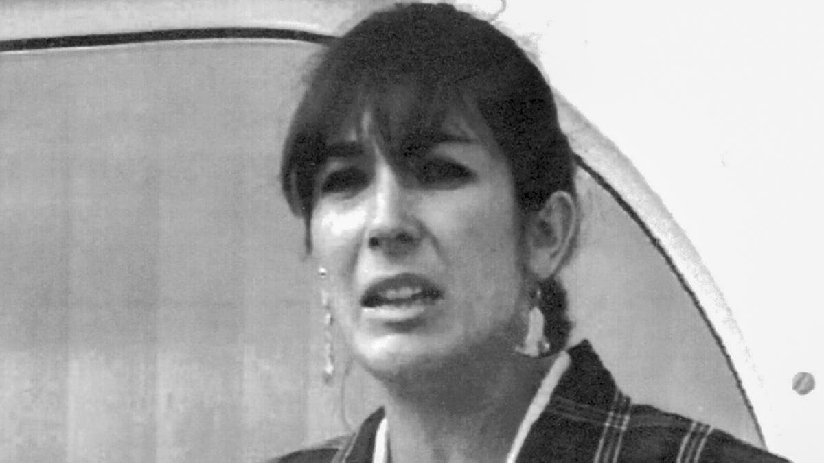 Ghislaine Maxwell, daughter of late British publisher Robert Maxwell, reads a statement expressing her family's gratitude to Spanish authorities after recovery of his body, in Nov. 7, 1991, in Tenerife, Spain. (AP Photo/Dominique Mollard, File)