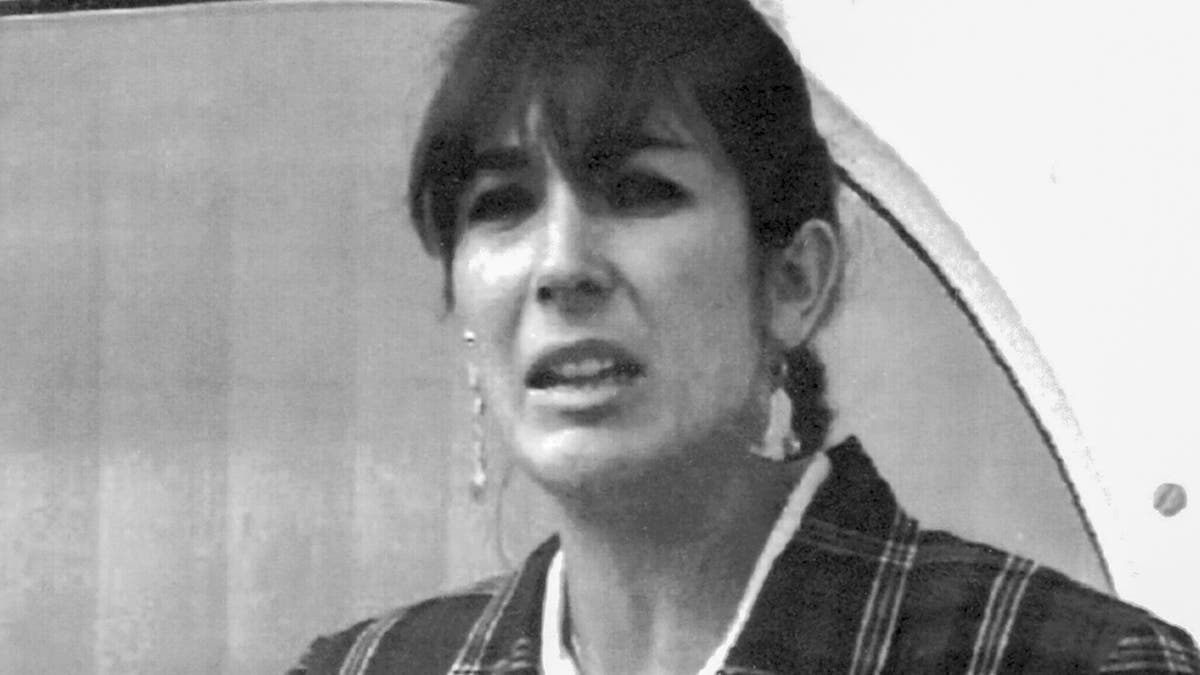 Ghislaine Maxwell, daughter of late British publisher Robert Maxwell, reads a statement expressing her family's gratitude to Spanish authorities after recovery of his body, in Nov. 7, 1991, in Tenerife, Spain. (AP Photo/Dominique Mollard, File)