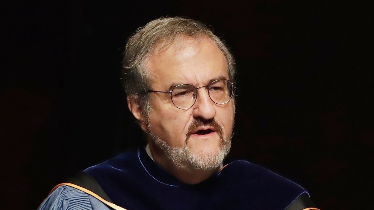 In this Jan. 30 2017, file photo, University of Michigan President Mark Schlissel speaks during a ceremony at the university, in Ann Arbor, Mich. Schlissel has been removed as president of the University of Michigan (AP Photo/Carlos Osorio, File)