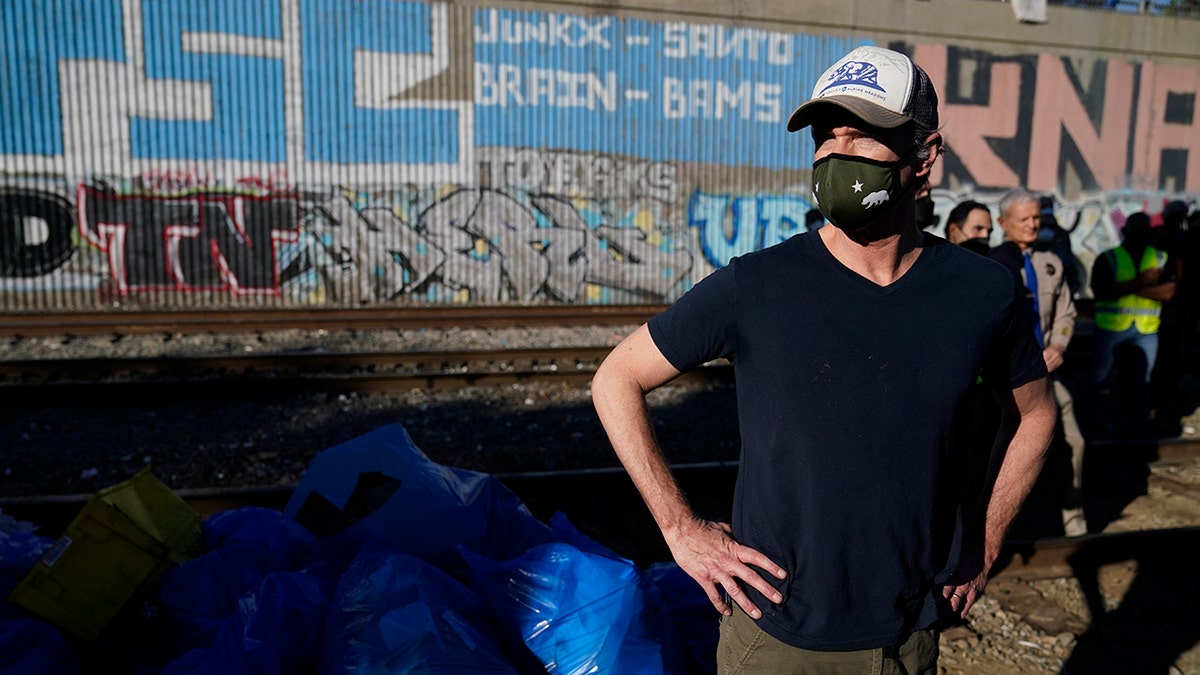 California Gov. Gavin Newsom visits a Union Pacific railroad site on Thursday, Jan. 20, 2022, in Los Angeles.