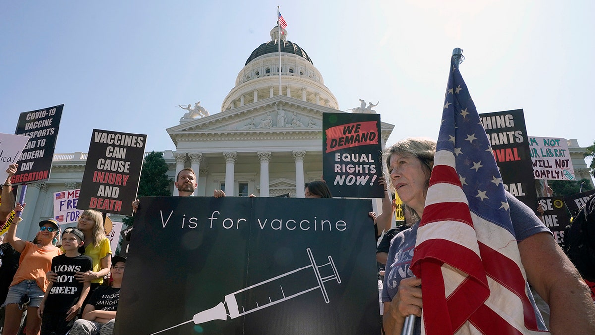Protesters opposing vaccine mandates gather at the Capitol in Sacramento, Calif., Wednesday, Sept. 8, 2021. State Sen. Scott Wiener, D-San Francisco, is introducing, Friday, Jan. 21, 2022 a bill that would allow children age 12 and up to be vaccinated without their parents consent. (AP Photo/Rich Pedroncelli, File)
