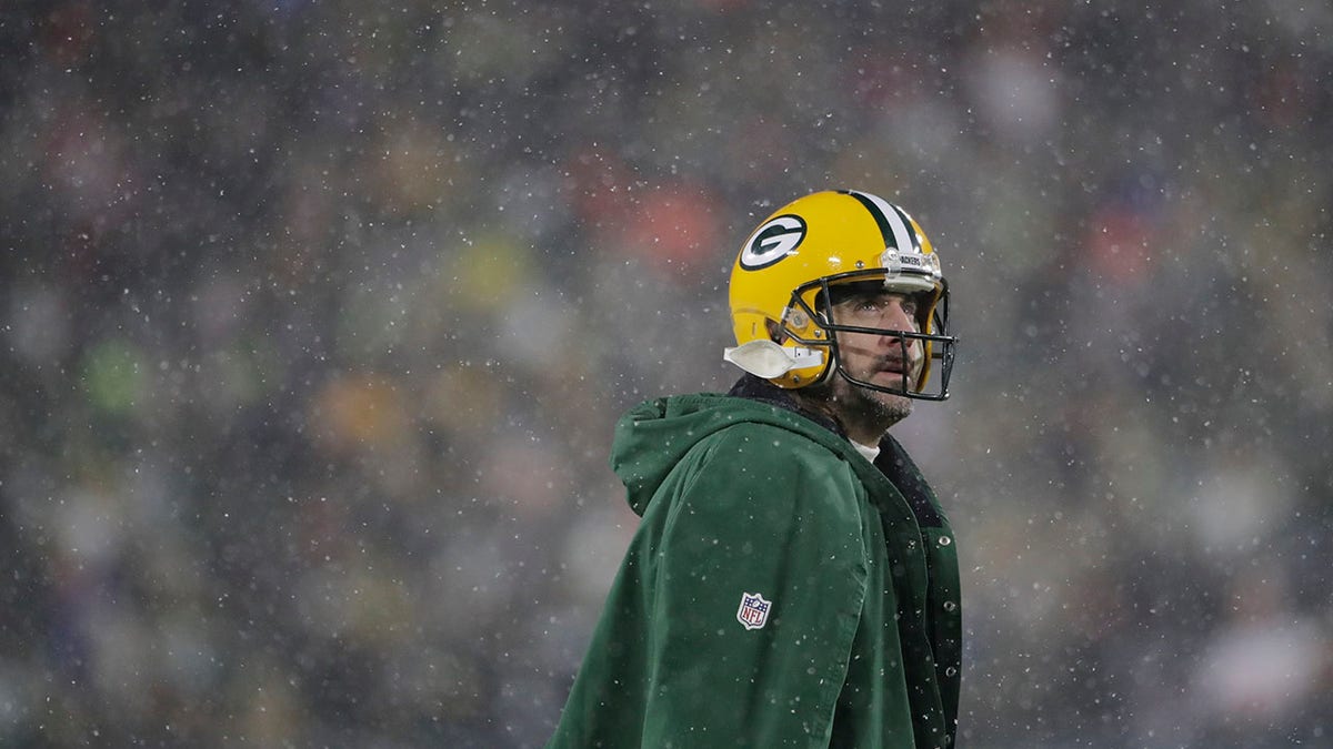 Green Bay Packers' Aaron Rodgers looks up during the second half of an NFC divisional playoff NFL football game against the San Francisco 49ers Saturday, Jan. 22, 2022, in Green Bay, Wis.