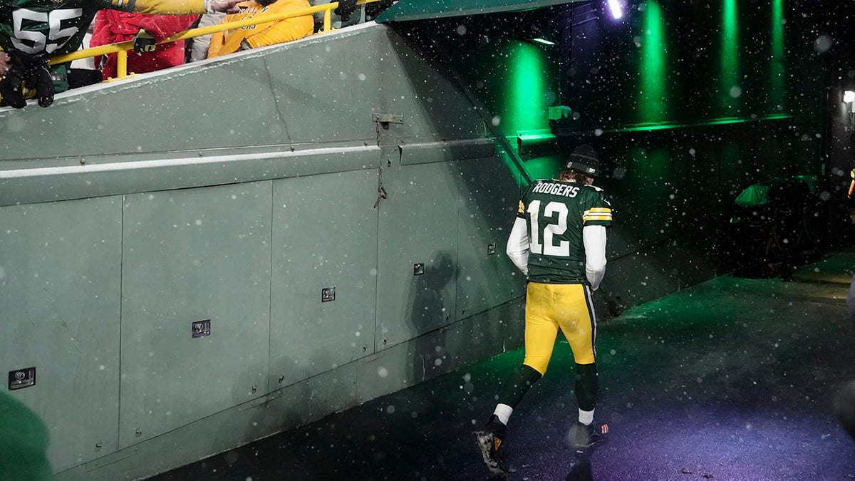 Green Bay Packers' Aaron Rodgers leaves the field after an NFC divisional playoff NFL football game against the San Francisco 49ers Saturday, Jan. 22, 2022, in Green Bay, Wis. The 49ers won 13-10 to advance to the NFC Chasmpionship game.